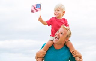 A father and son celebrating the 4th of July in Naples, Florida.