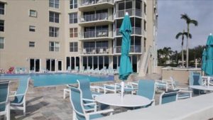 The pool area of a Naples, Florida, rental to relax by while working on your packing list for going home.