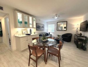 The dining area of a Naples rental to enjoy a meal from one of the best downtown restaurants. 